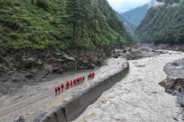 Rescue workers operating in Shigatse in Tibet after devastating flooding and landslides