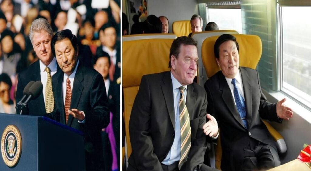 新华社发放的朱鎔基生前照片自是有意思，而当中只有两张是涉及外国领导人的，分别是1999年朱镕基访美期间出席美国时任总统克林顿的欢迎仪式(左图)，以及2002年与访华的德国时任总理施罗德共乘磁浮列车(右图)。