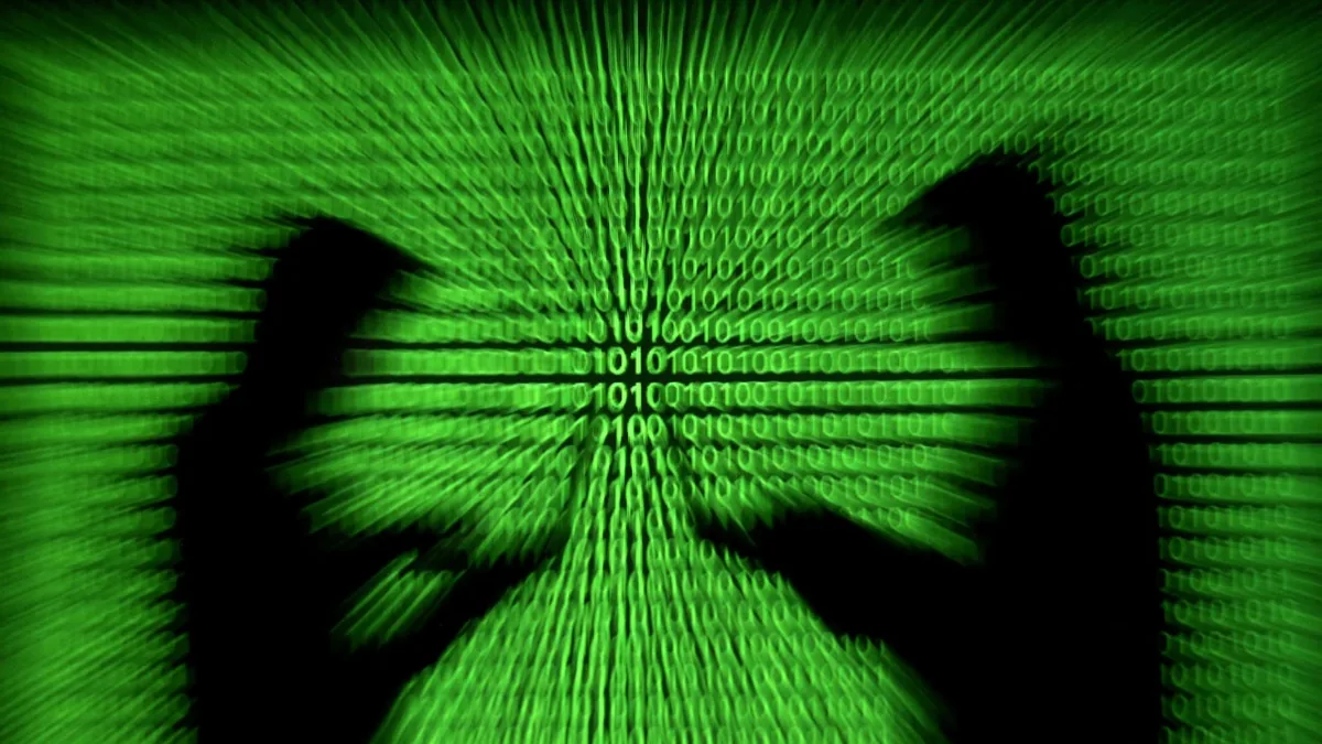 二进制代码投影和人手的剪影（示意图）
